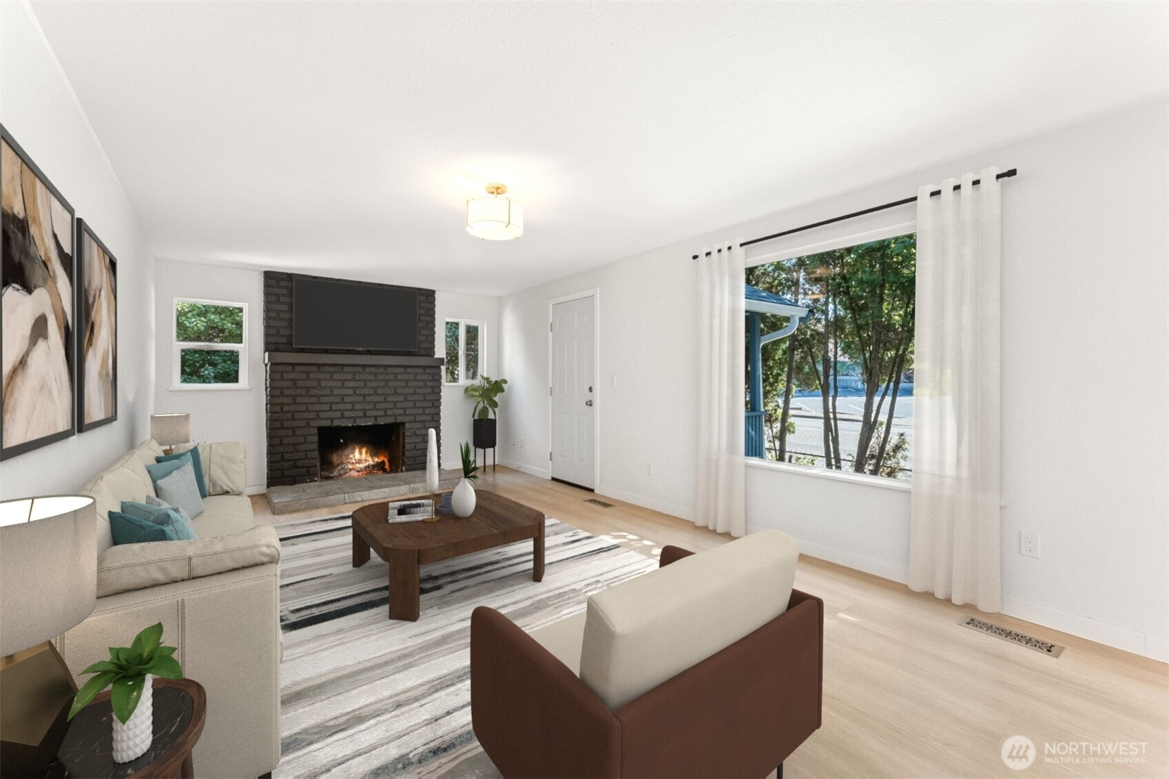 1616 11th Street Bremerton, WA 98337 - Photo 4 of 33 a living room with furniture and a fireplace