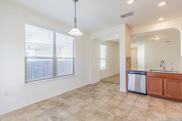 a view of a kitchen with a sink and dishwasher kitchen view