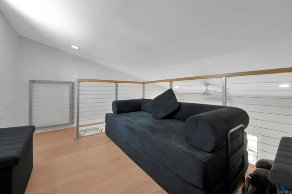 a view of a balcony with a bench