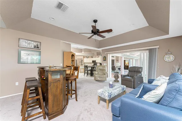 a balcony with furniture and wooden floor