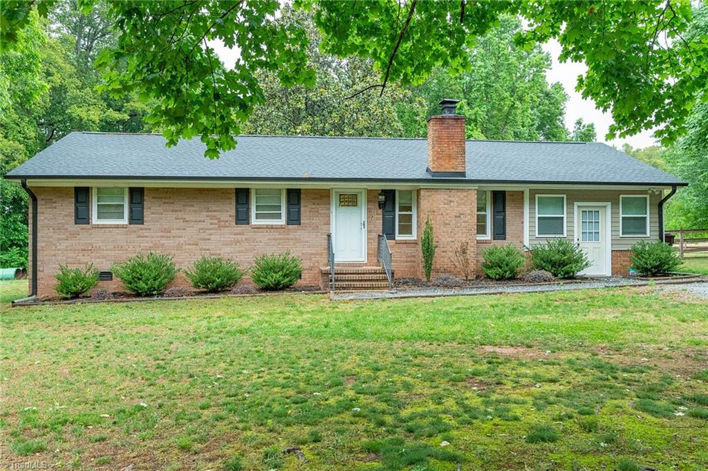 5947 Poley Road Browns Summit, NC 27214 - Photo 1 of 34 Front