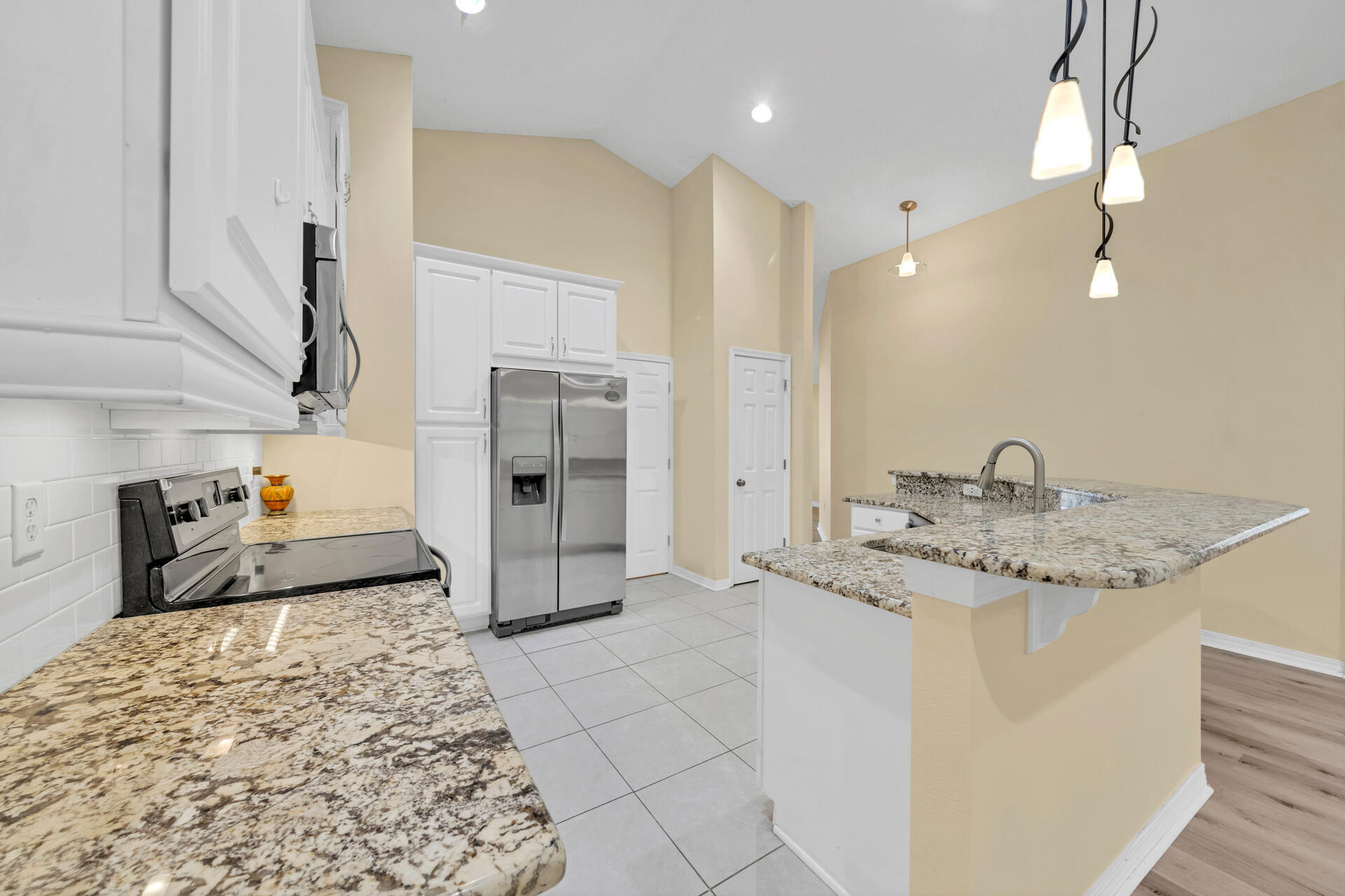 246 Bayou Landing Road Santa Rosa Beach, FL 32459 - Photo 7 of 29 a bathroom with a granite countertop sink and a mirror