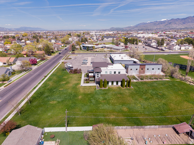 830 North 200 West Logan, UT 84321 - Photo 5 of 7 Aerial view of residential area with a mountain backdrop