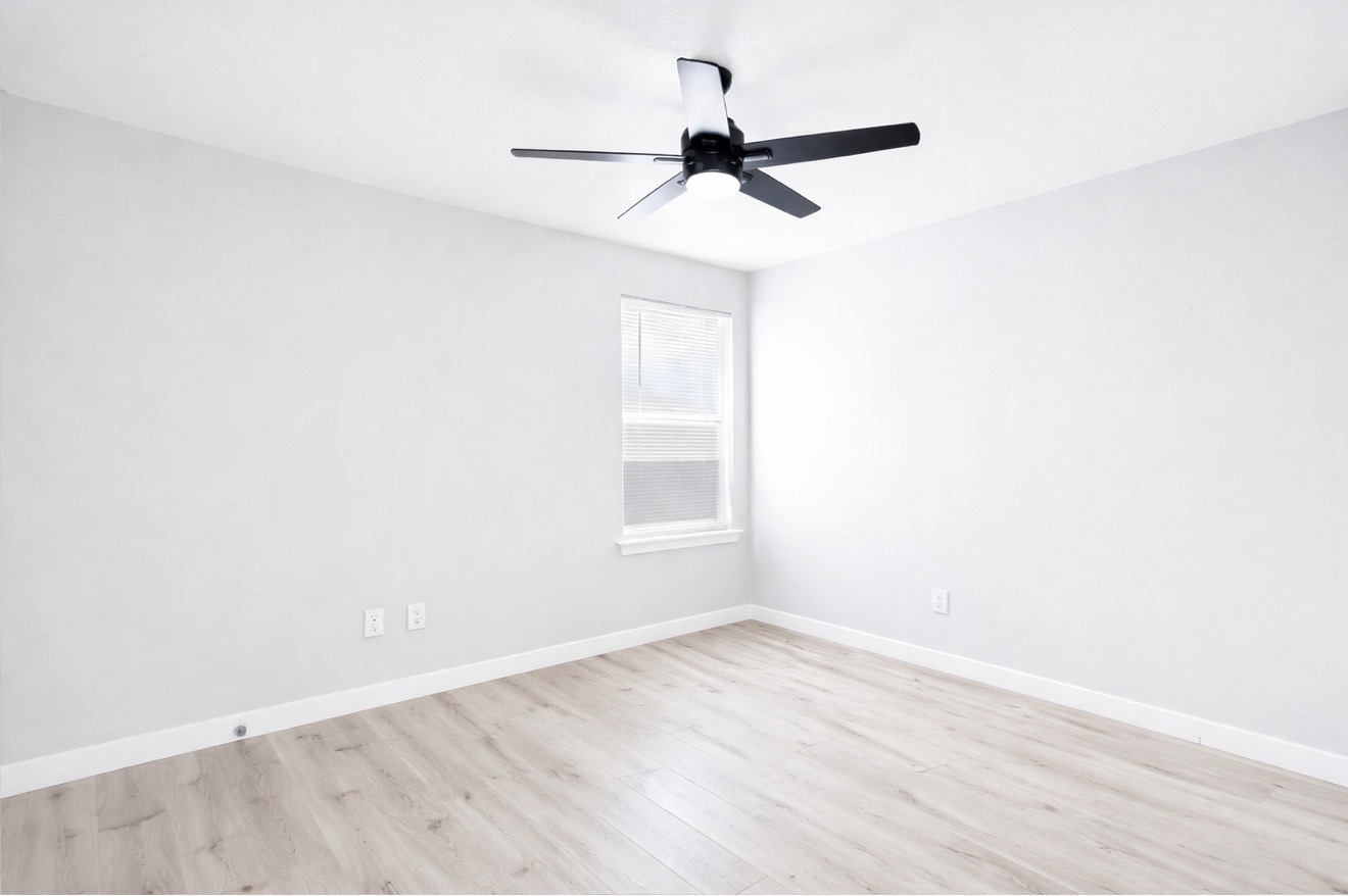 313 Drystone Trail Liberty Hill, TX 78642 - Photo 14 of 17 Spare room featuring light wood-style floors and a ceiling fan