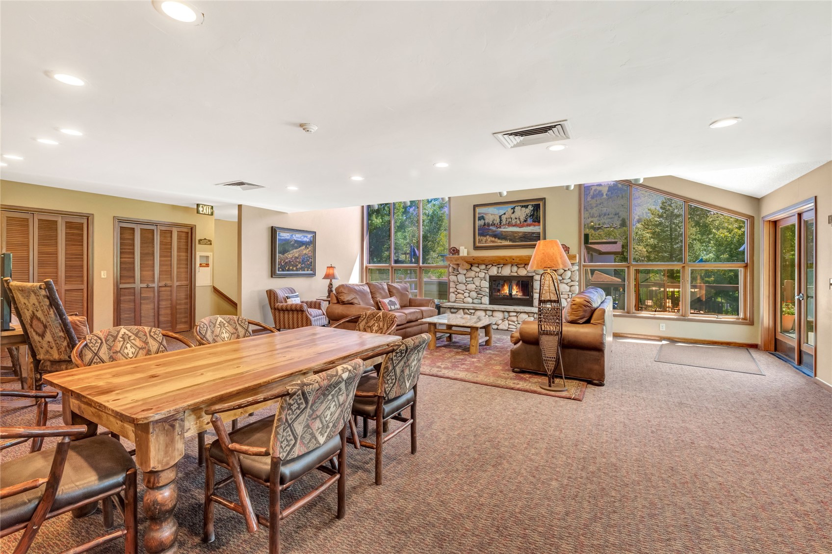 1720 Ranch Road, Unit 309 Steamboat Springs, CO 80487 - Photo 38 of 43 a view of a dining room with furniture window and outside view