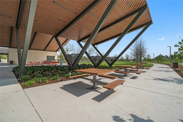 a view of a backyard with sitting area