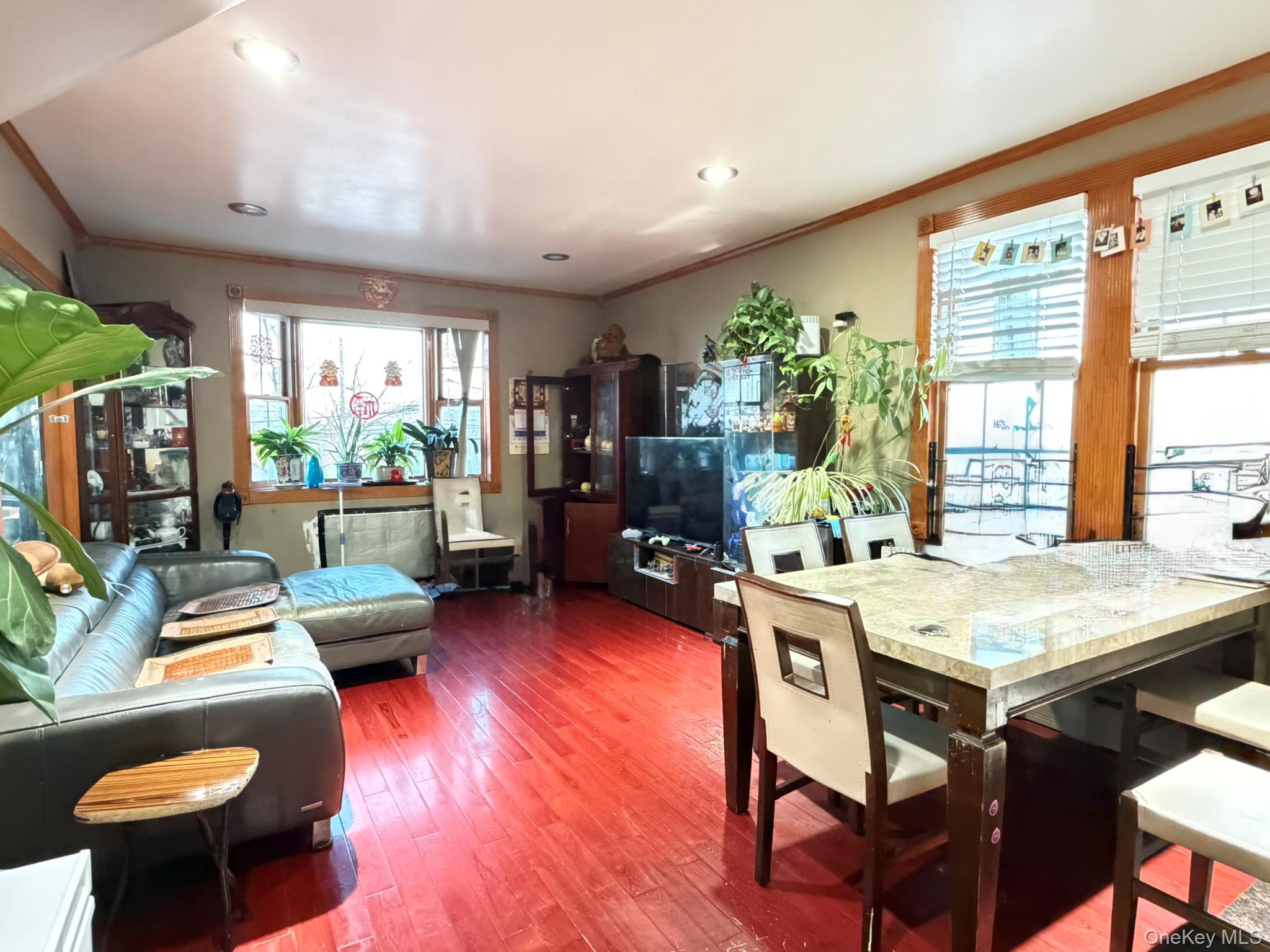 111-20 14th Road Queens, NY 11356 - Photo 4 of 13 a view of a dining room with furniture window and outside view