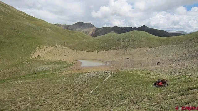 a view of lake with mountain