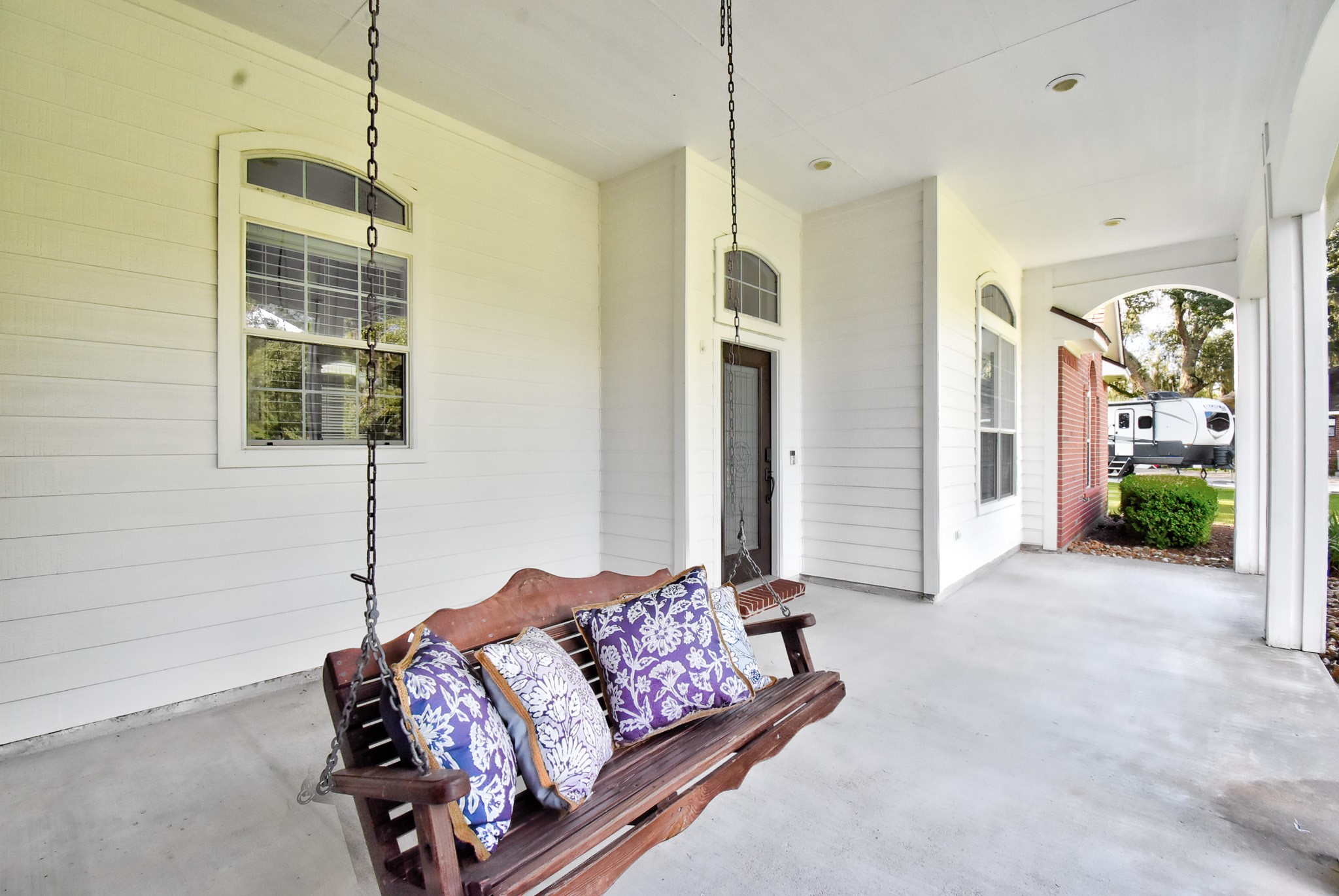 7547 County Road 684D Sweeny, TX 77480 - Photo 36 of 48 Enjoy the evening breeze on the Deep Relaxing porches!