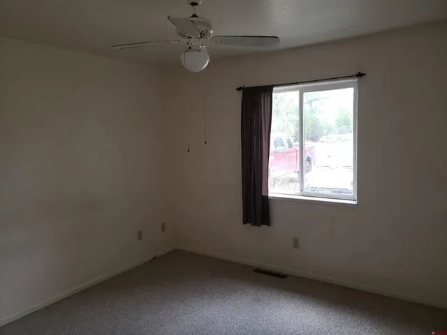 an empty room with a window