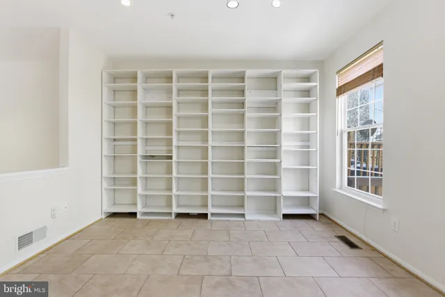 an empty room with a empty shelves