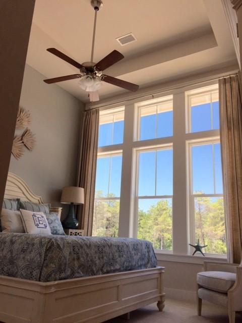 25 W Pine, Unit B Inlet Beach, FL 32461 - Photo 12 of 44 a living room with a large bed and a large window