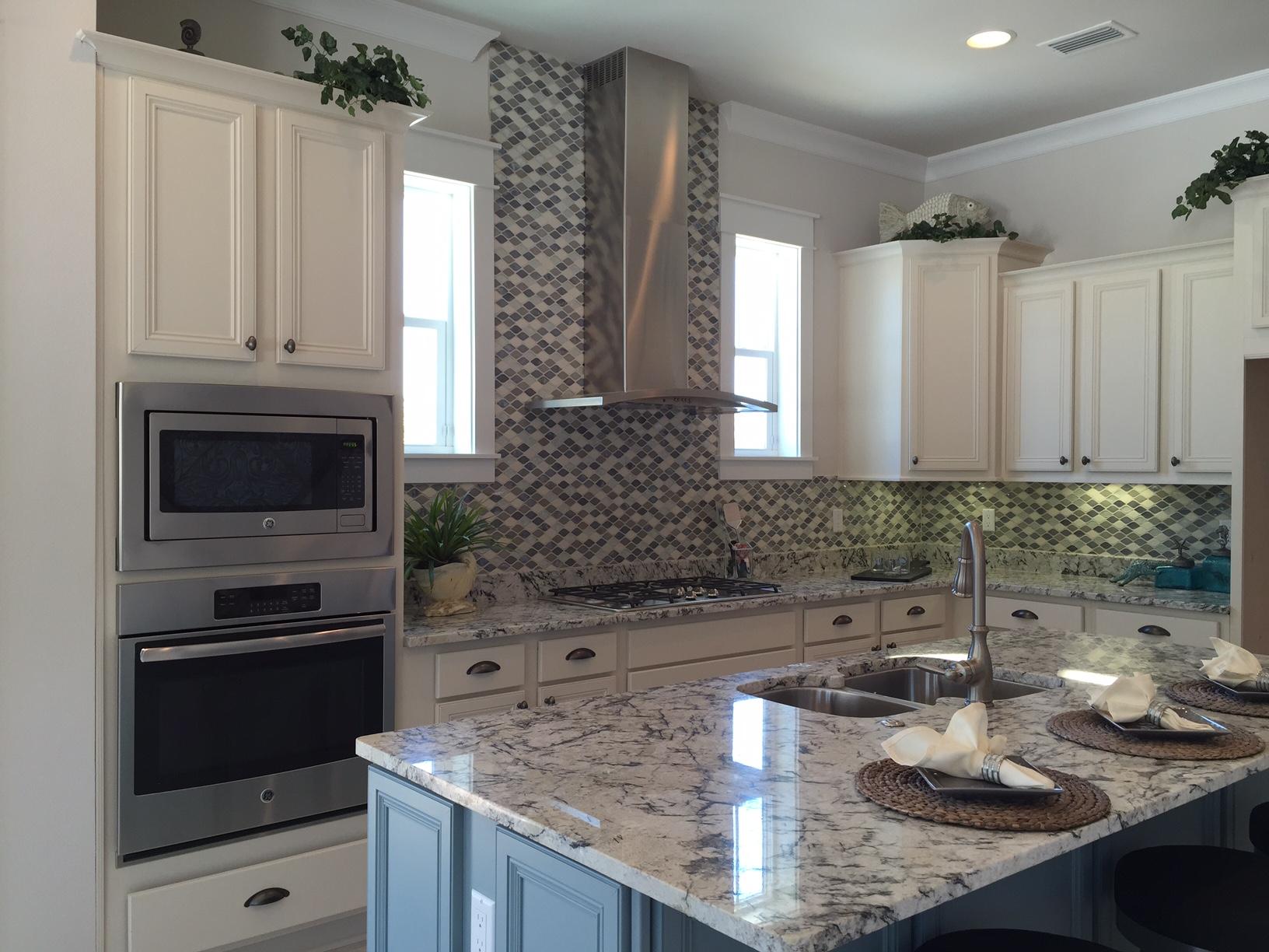 25 W Pine, Unit B Inlet Beach, FL 32461 - Photo 13 of 44 a kitchen with granite countertop a sink and a stove