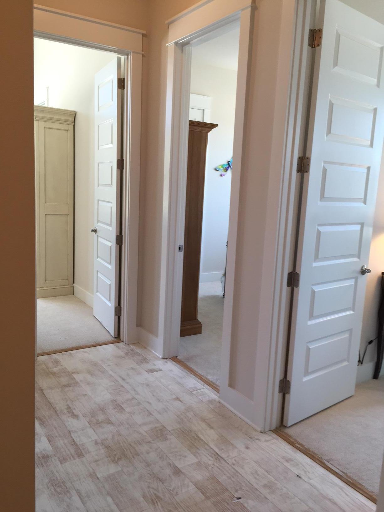 25 W Pine, Unit B Inlet Beach, FL 32461 - Photo 15 of 44 a view of a hallway with wooden floor and entryway