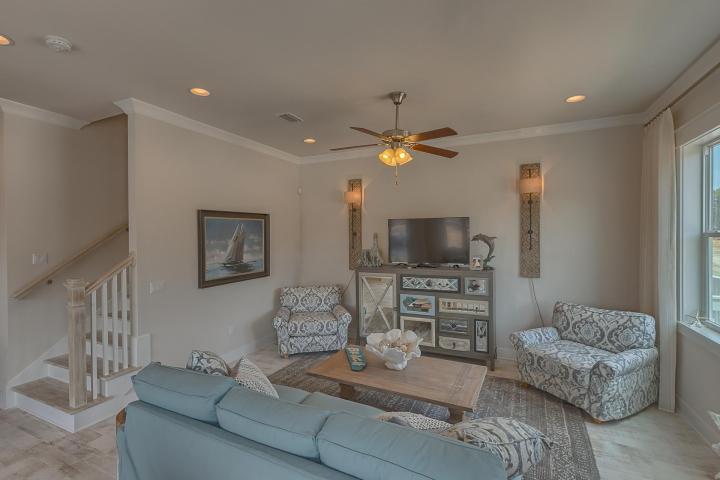 25 W Pine, Unit B Inlet Beach, FL 32461 - Photo 33 of 44 a living room with furniture and a flat screen tv