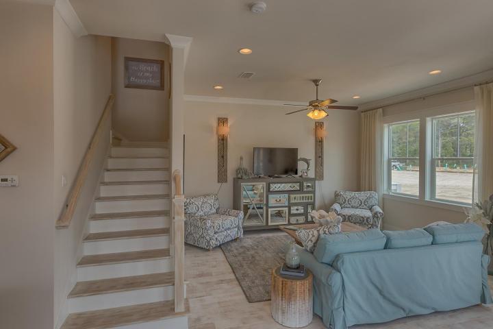 25 W Pine, Unit B Inlet Beach, FL 32461 - Photo 34 of 44 a living room with furniture and a flat screen tv