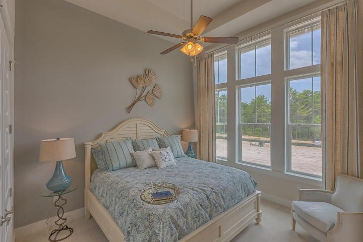 25 W Pine, Unit B Inlet Beach, FL 32461 - Photo 40 of 44 a bedroom with a bed and a window