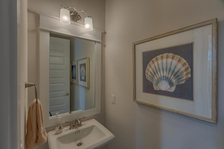 25 W Pine, Unit B Inlet Beach, FL 32461 - Photo 41 of 44 a bathroom with a sink and a mirror