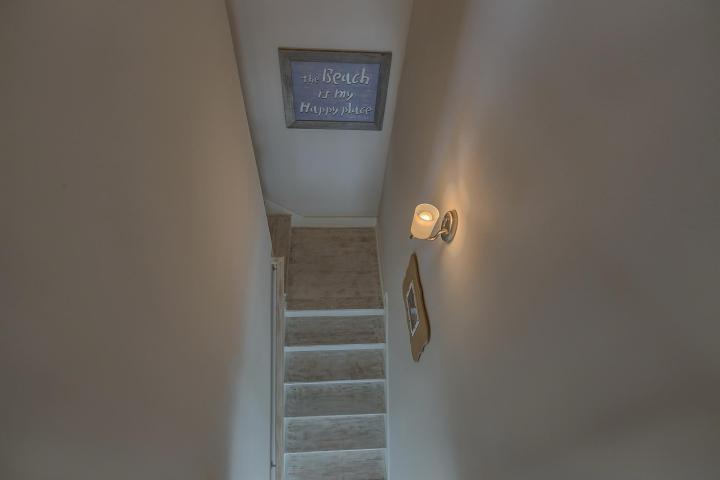 25 W Pine, Unit B Inlet Beach, FL 32461 - Photo 42 of 44 a view of hallway with stairs