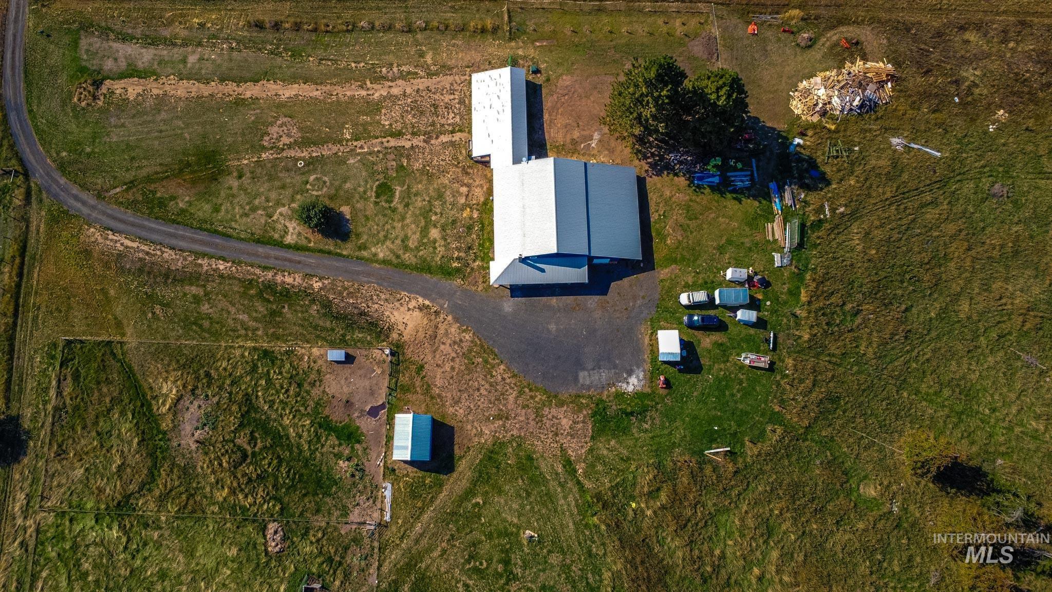 263 Glory Lane Orofino, ID 83544 - Photo 43 of 48 Aerial view of property and surrounding area with rural landscape