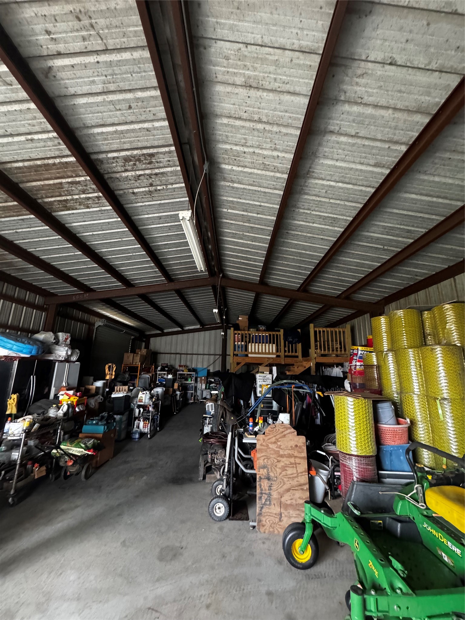 317 12th Street Palacios, TX 77465 - Photo 14 of 31 a view of a garage with parked cars
