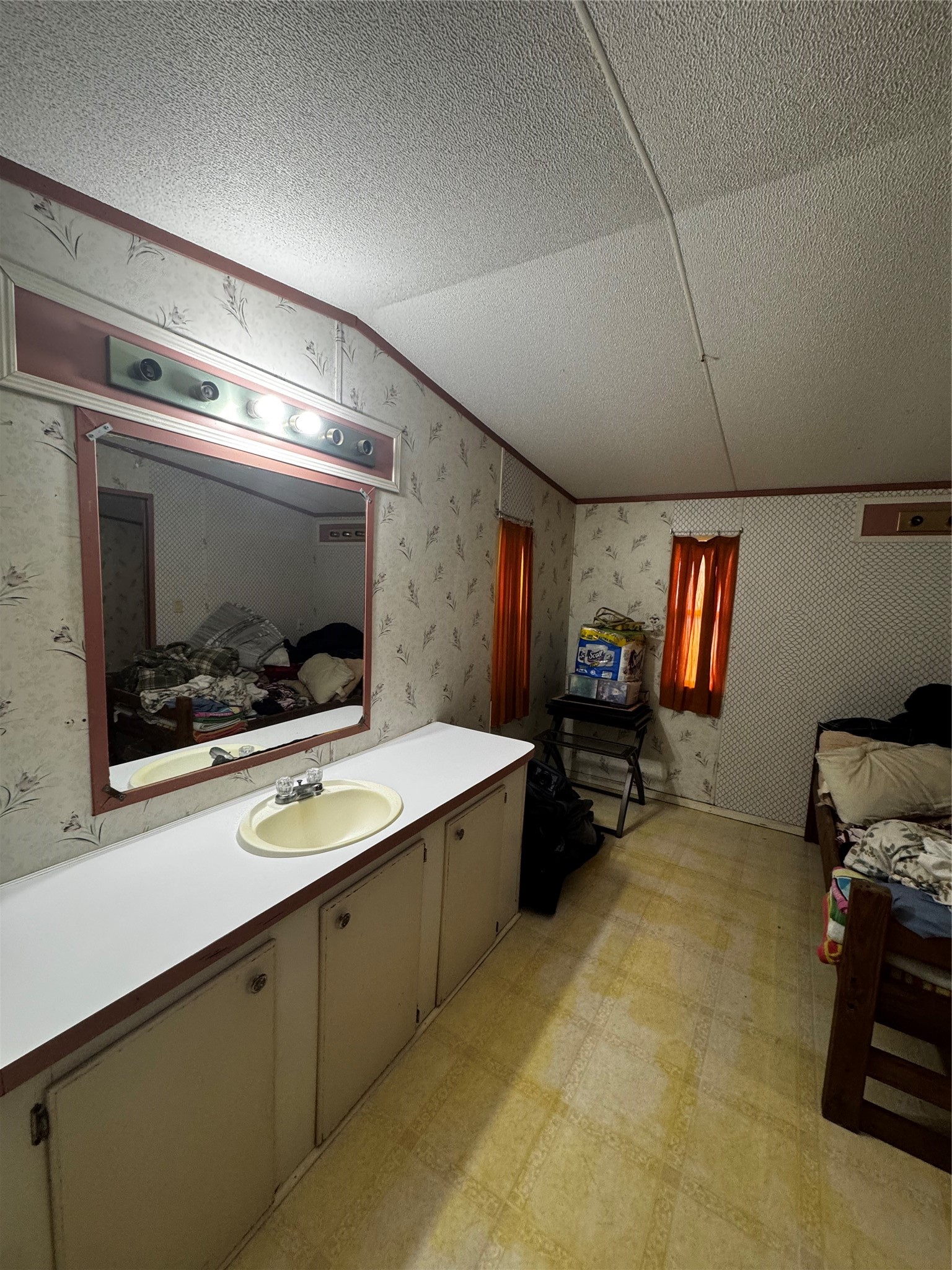 317 12th Street Palacios, TX 77465 - Photo 30 of 31 a room with furniture and flat screen tv