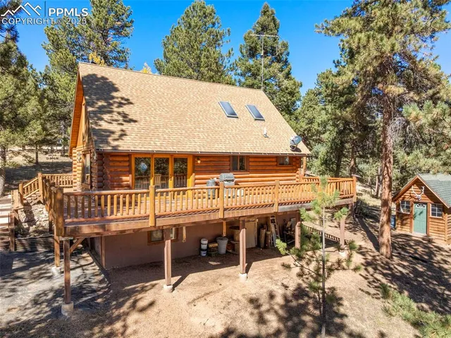 a balcony with view of trees
