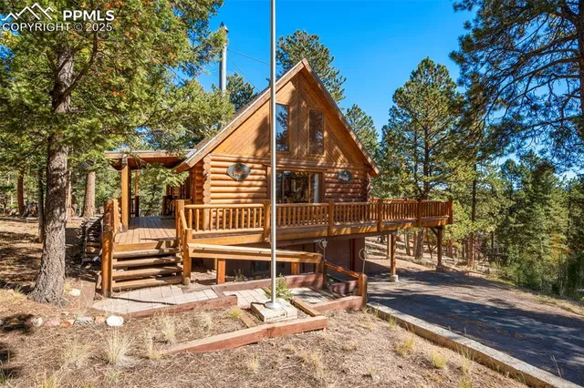 a view of a swimming pool with an outdoor seating