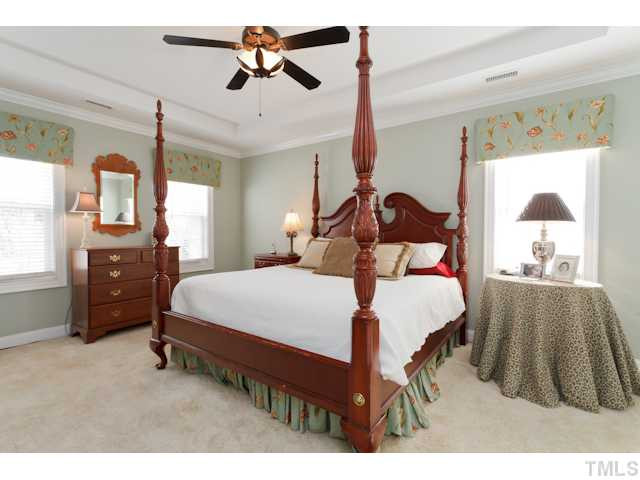 4216 Oakthorne Way Raleigh, NC 27613 - Photo 13 of 24 Large Master Suite with Trey Ceilings, Ceiling Fan, and extensive molding. Master Bedroom
