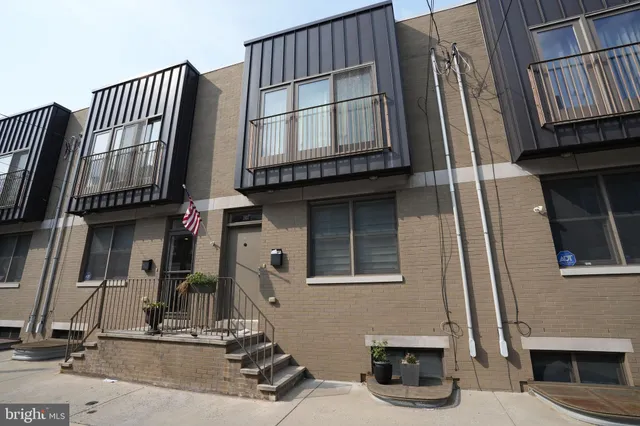a view of front door with outdoor