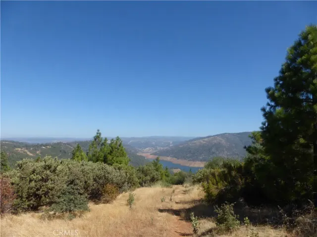 a view of a lake with a mountain in the background