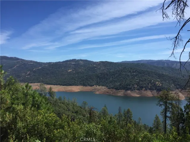 a view of a yard covered in snow