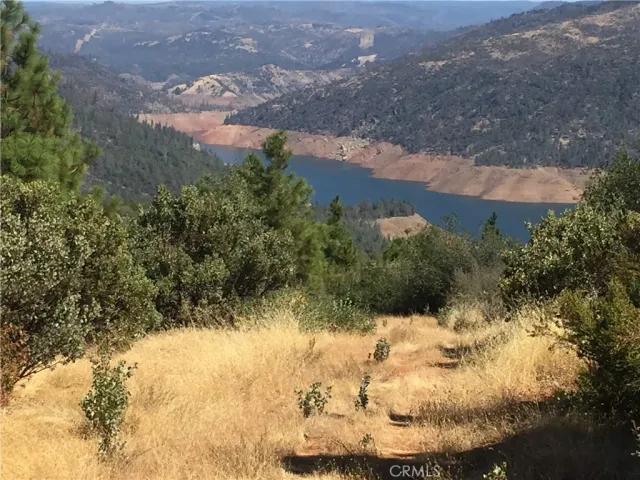 a view of a lake and mountain in the back