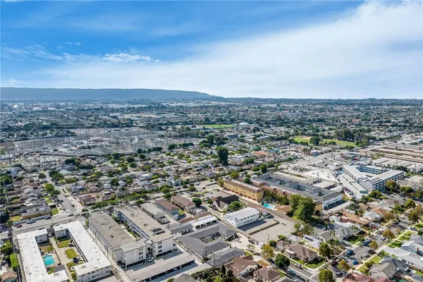 an aerial view of residential building with parking space