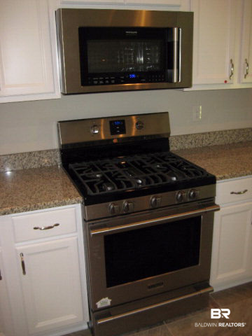 11778 Lodgepole Court Daphne, AL 36527 - Photo 4 of 16 Frigidaire Professional series 5 burner gas stove, convection oven/microwave combination and ultra quiet dishwasher