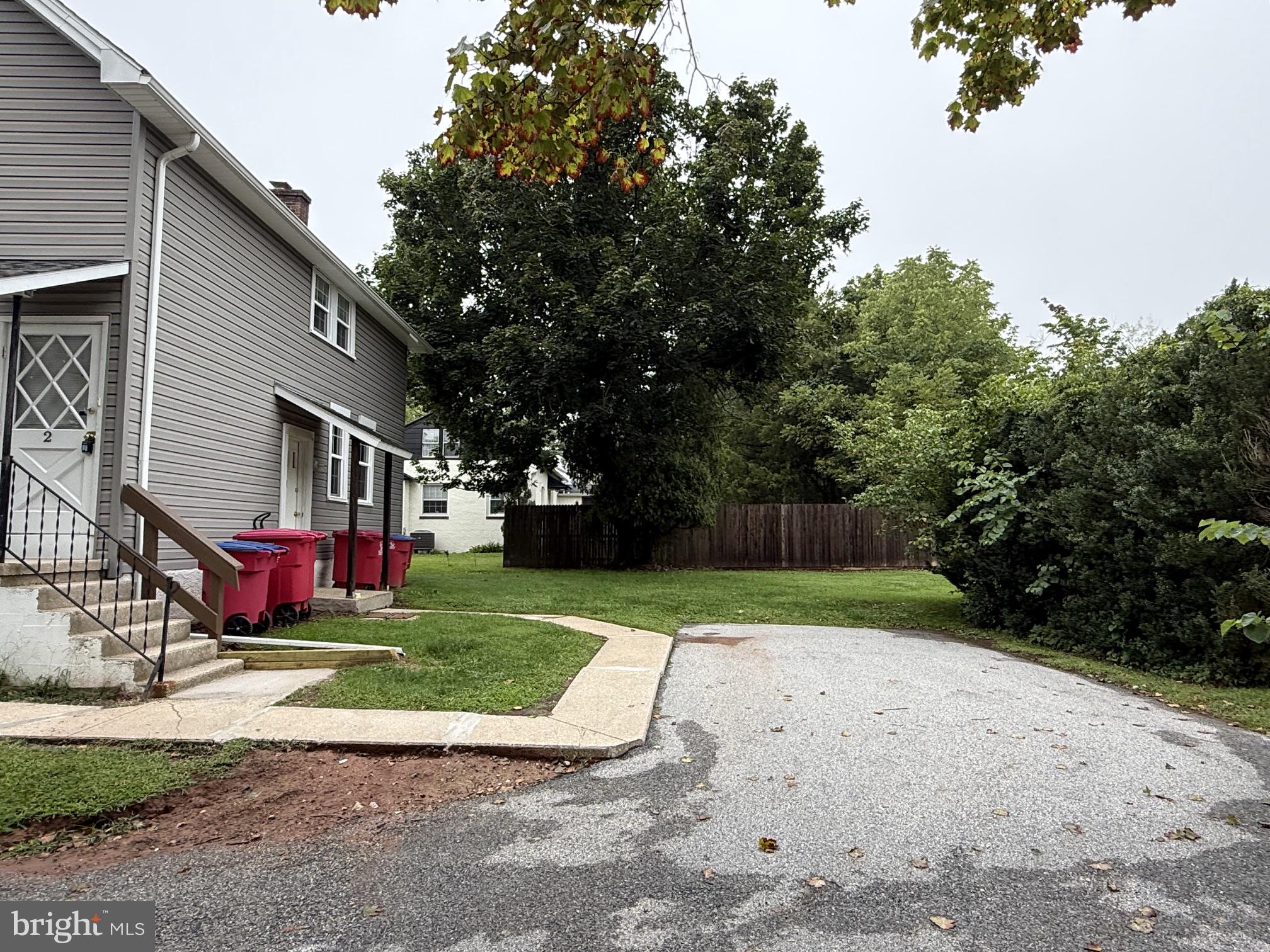 19 East Pothouse Road Phoenixville, PA 19460 - Photo 2 of 11 Driveway parking and backyard