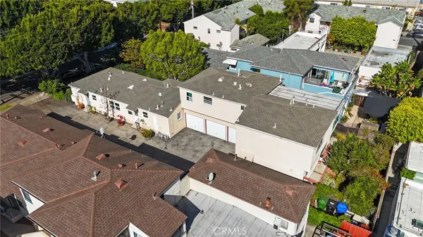 an aerial view of house with yard