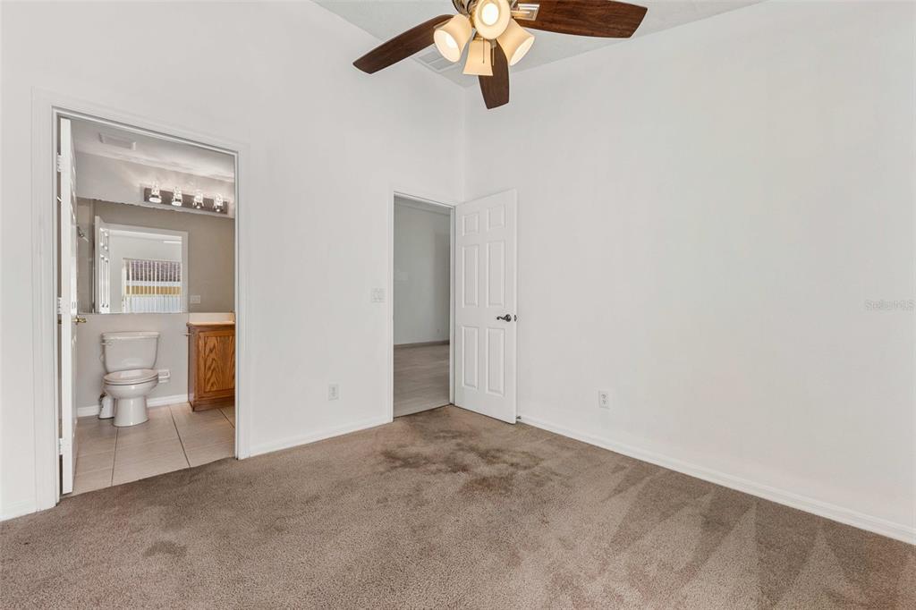 2627 Oneida Loop Kissimmee, FL 34747 - Photo 21 of 32 a view of an empty room