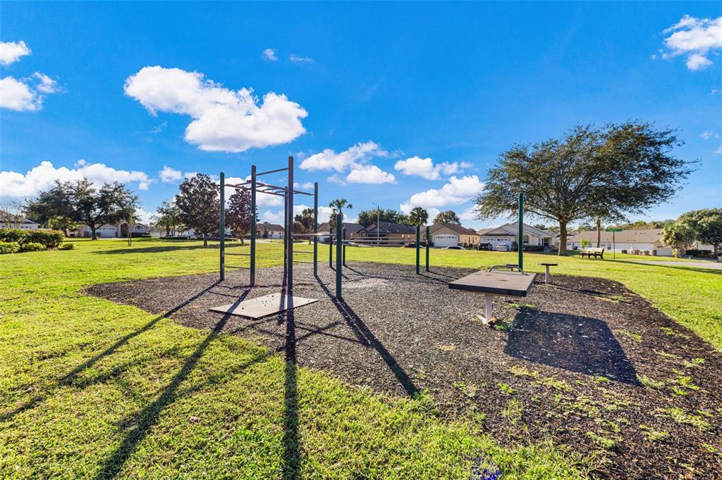 2627 Oneida Loop Kissimmee, FL 34747 - Photo 28 of 32 a view of a swimming pool with a patio