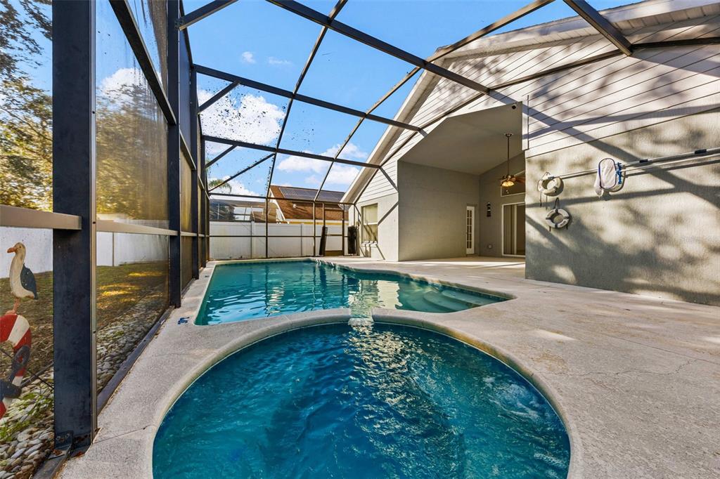 2627 Oneida Loop Kissimmee, FL 34747 - Photo 3 of 32 a view of yard from deck