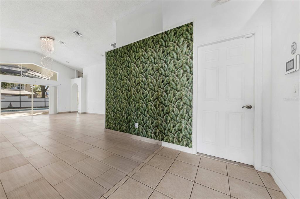 2627 Oneida Loop Kissimmee, FL 34747 - Photo 7 of 32 a view of entryway with stairs