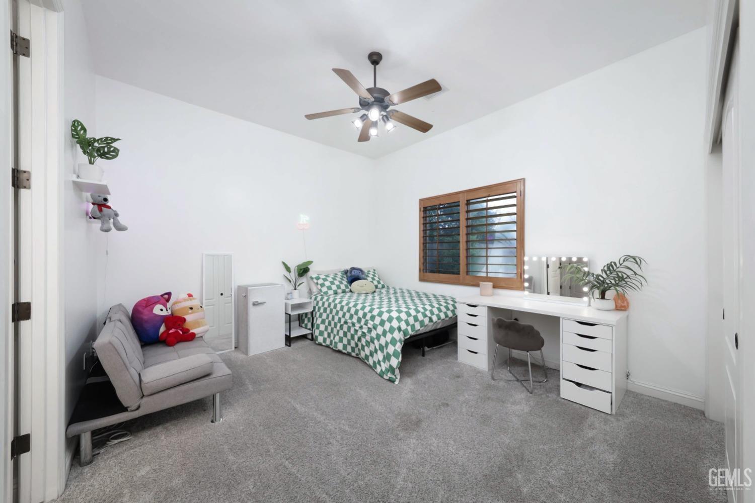Undisclosed Address Bakersfield, CA 93312 - Photo 22 of 36 a living room with furniture and a window