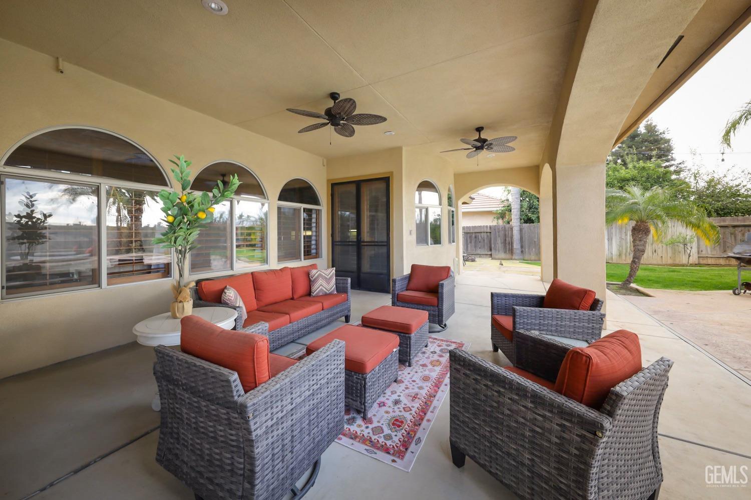 Undisclosed Address Bakersfield, CA 93312 - Photo 25 of 36 a living room with furniture and a large window