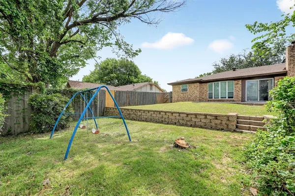a house view with a garden space