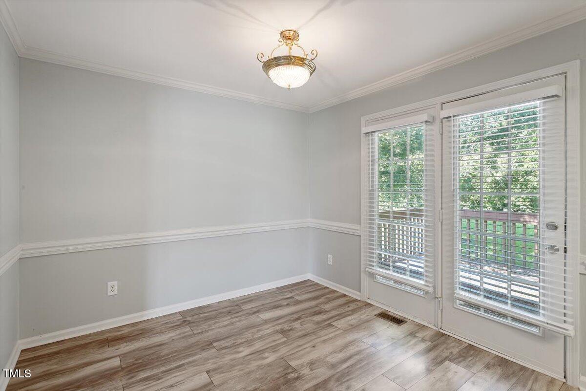 2474 Sumter Drive Garner, NC 27529 - Photo 11 of 27 a view of an empty room with a window