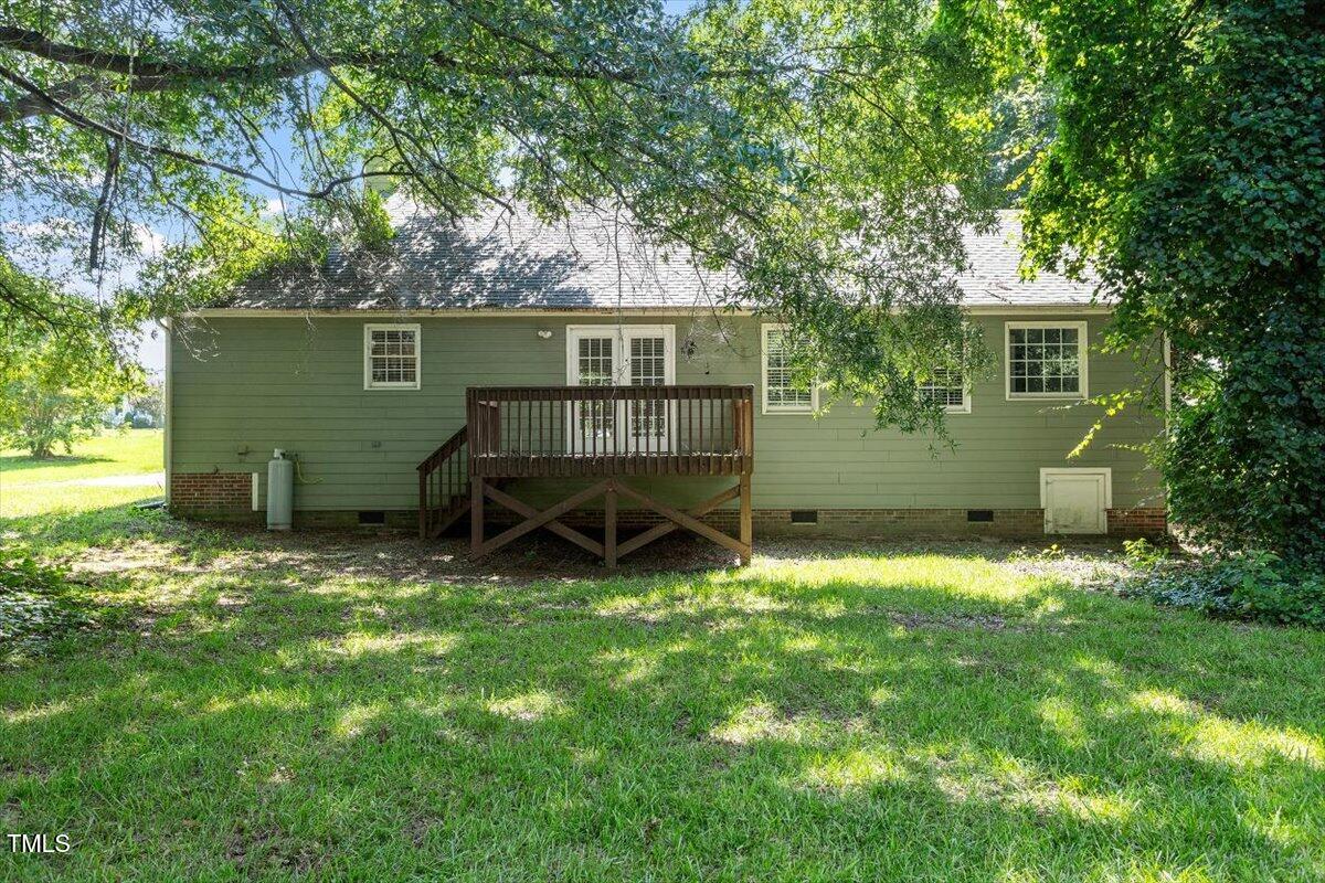 2474 Sumter Drive Garner, NC 27529 - Photo 24 of 27 front view of a house with a yard