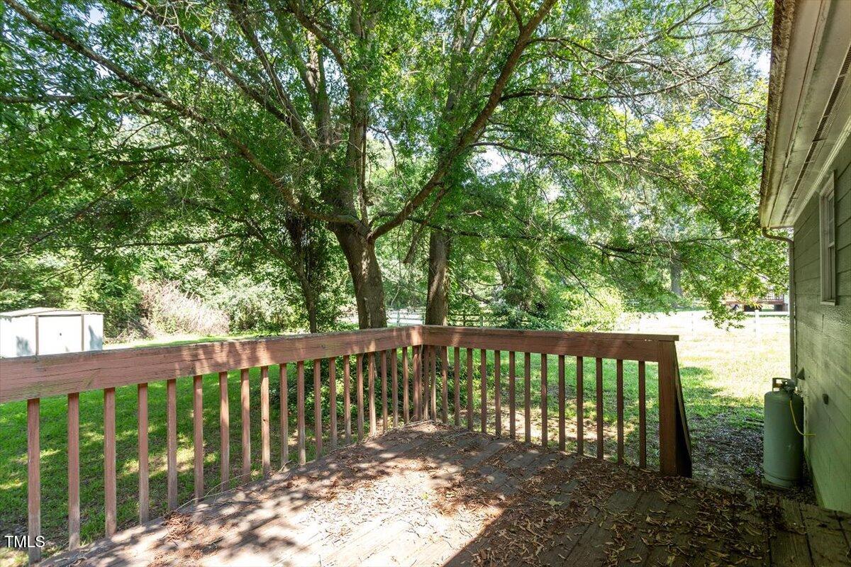 2474 Sumter Drive Garner, NC 27529 - Photo 26 of 27 a view of a wooden roof deck