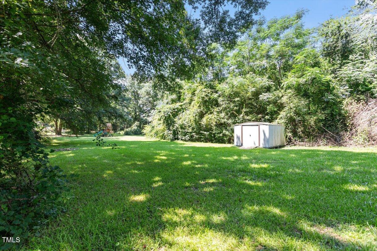 2474 Sumter Drive Garner, NC 27529 - Photo 27 of 27 a view of a trees with a yard
