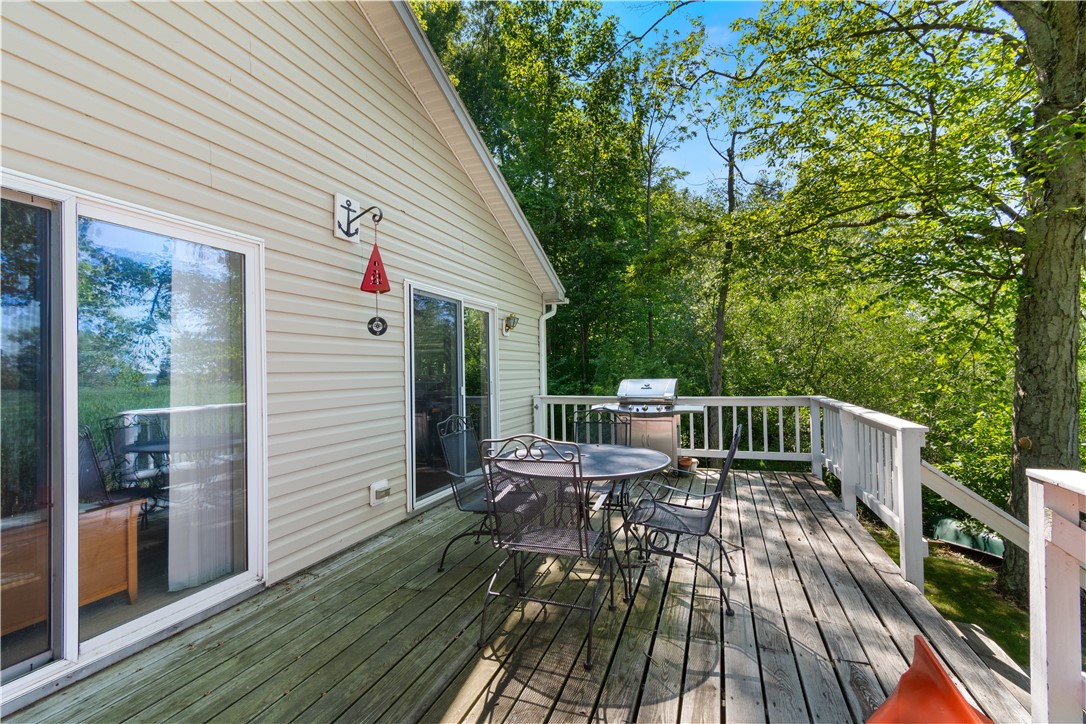 6925 Emerald Point Road Sodus, NY 14555 - Photo 6 of 32 Imagine meals on the deck enjoying the waterfront