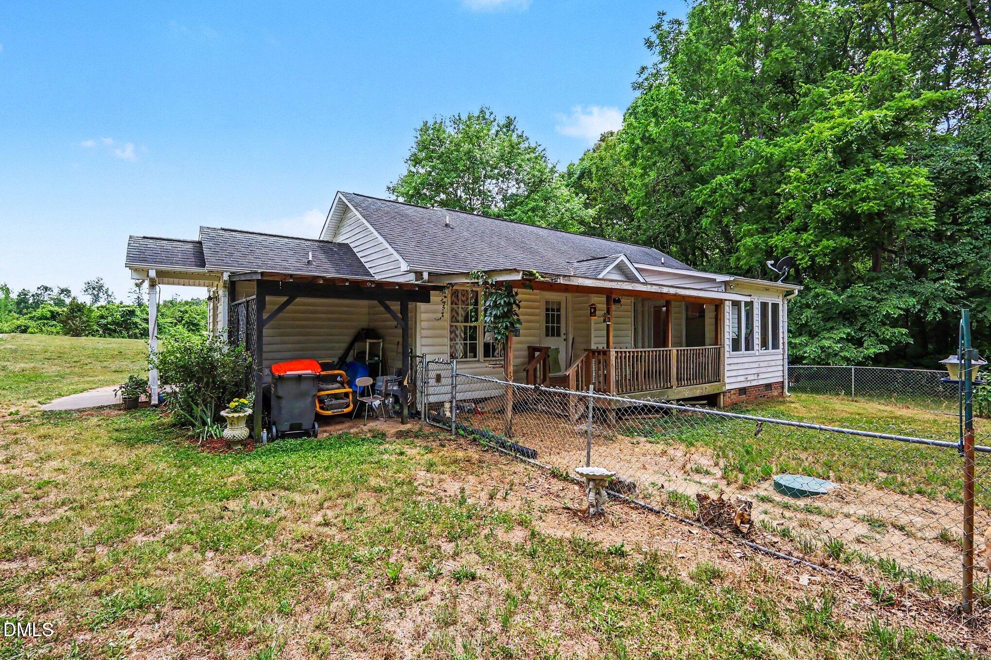 1750 Tom Oakley Road Timberlake, NC 27583 - Photo 24 of 31 a view of a house with backyard